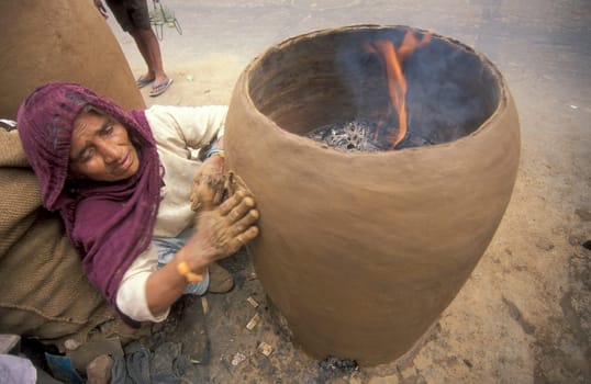Working People in a Pottery Factory in the City of Jaipur in the Province of Rajasthan in India.  India, Jaipur, January, 1998