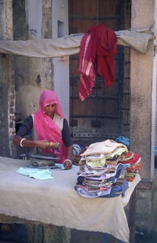 a women at her Laundry homework in the City of Jaipur in the Province of Rajasthan in India.  India, JAIPUR, January, 1998