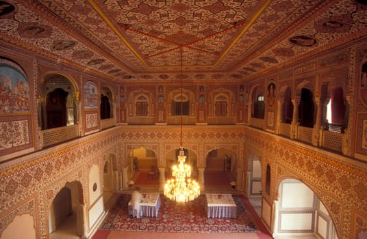 Inside the Samode Palace Hotel near the City of Jaipur in the Province of Rajasthan in India.  India, Jaipur, January, 1998