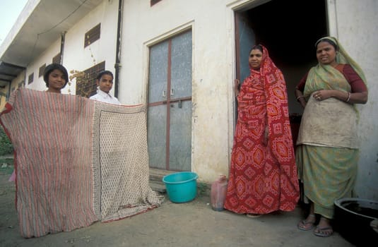 Working People in a textile coloring and dryeing Factory in the City of Jaipur in the Province of Rajasthan in India.  India, Jaipur, January, 1998