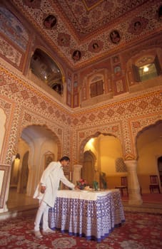 Inside the Samode Palace Hotel near the City of Jaipur in the Province of Rajasthan in India.  India, Jaipur, January, 1998