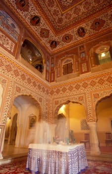 Inside the Samode Palace Hotel near the City of Jaipur in the Province of Rajasthan in India.  India, Jaipur, January, 1998