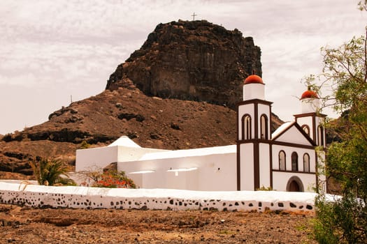View of the chapel of our Lady of the snows ‘Ermita Nuestra Señora de las Nieves’, a popular photo motif in Puerto de las Nieves, Las Palmas, Gran Canaria, Spain.