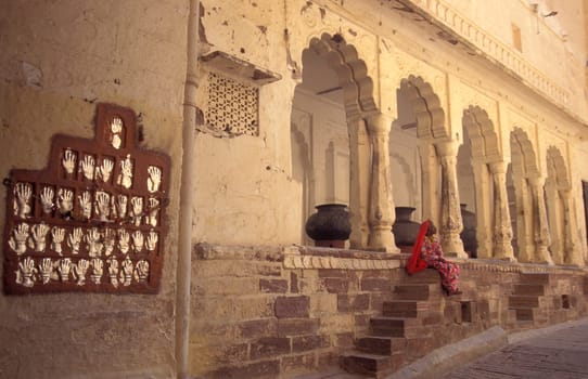 Women Queens Handprints of Sati and grid of Sculpted hands at the Meherangarh in the Town of Jodhpur in the Province of Rajasthan in India.  India, Jodhpur, January, 1998