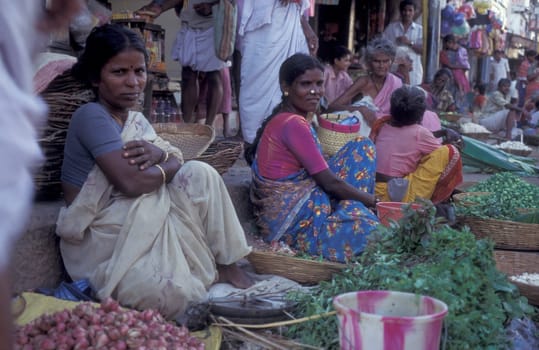 People at Streetmarket and alley in the city of Chennai in Province Tamil Nadu in India.  India, Chennai, April, 1998