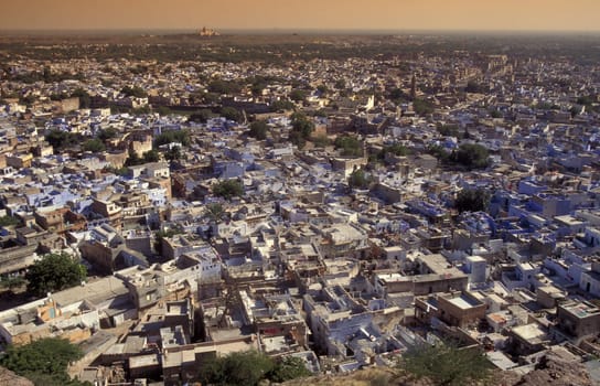 a view with living Houses in the Blue City and Town of Jodhpur in the Province of Rajasthan in India.  India, Jodhpur, January, 1998