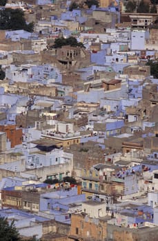 a view with living Houses in the Blue City and Town of Jodhpur in the Province of Rajasthan in India.  India, Jodhpur, January, 1998