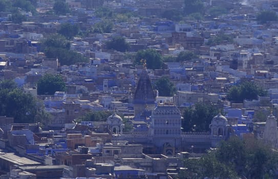 a view with living Houses in the Blue City and Town of Jodhpur in the Province of Rajasthan in India.  India, Jodhpur, January, 1998