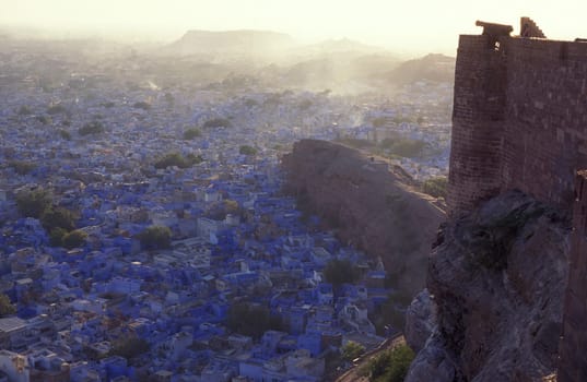 a view from the Meherangarh to the Town and Blue City of Jodhpur in the Province of Rajasthan in India.  India, Jodhpur, January, 1998
