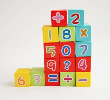 Number wood block cubes for learning Mathematic, education math concept.