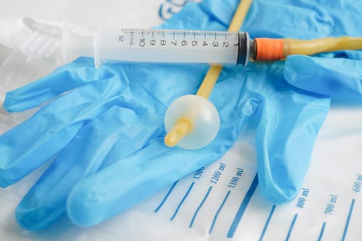 Foley catheter and urine drainage bag collect urine for disability or patient in hospital.