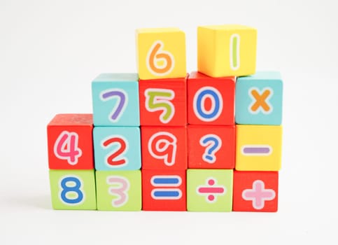 Number wood block cubes for learning Mathematic, education math concept.