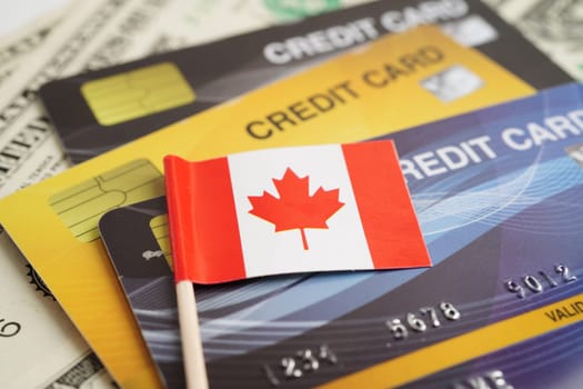 Canada flag on credit card, finance economy trading shopping online business.