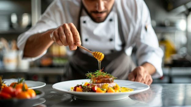 A chef pours honey on a platter in a stylish kitchen.