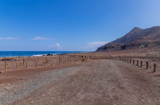 Gran Canaria, Spain: March 3, 2024: People at el Confital beach on the edge of Las Palmas, La Isleta peninsula. Gran Canaria, Spain