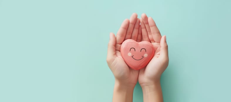 Holding a heart with a happy smiling face, mental health concept, positive thinking mind and attitude, support and self esteem, love and emotion