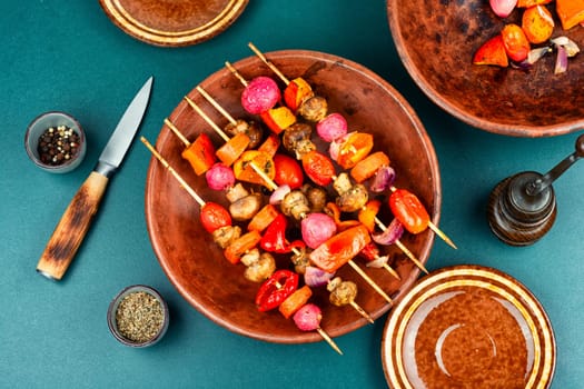 BBQ vegetable skewers. Colorful grilled summer seasonal vegetables skewers. Flat lay.