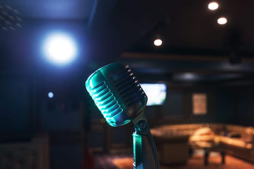 Retro music microphone on stage in a night club. Show or performance concept