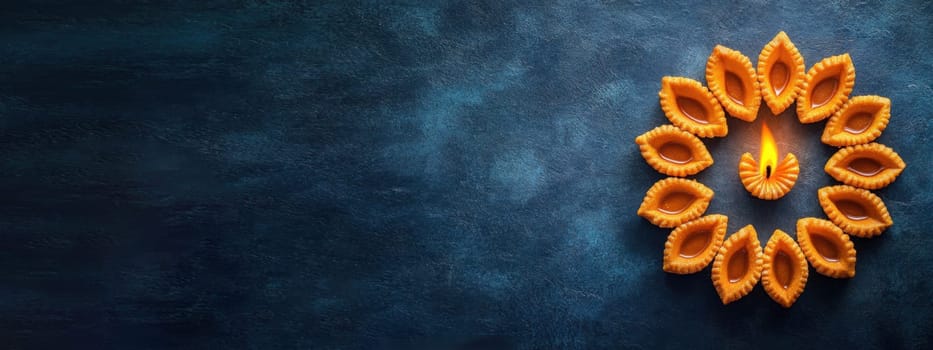 Diwali Diyas on Blue Background