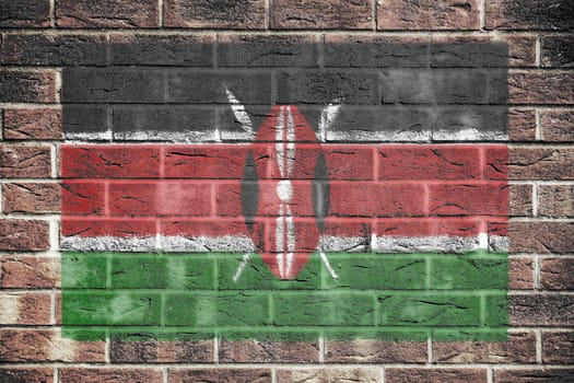 A Kenya flag painted on brick wall background