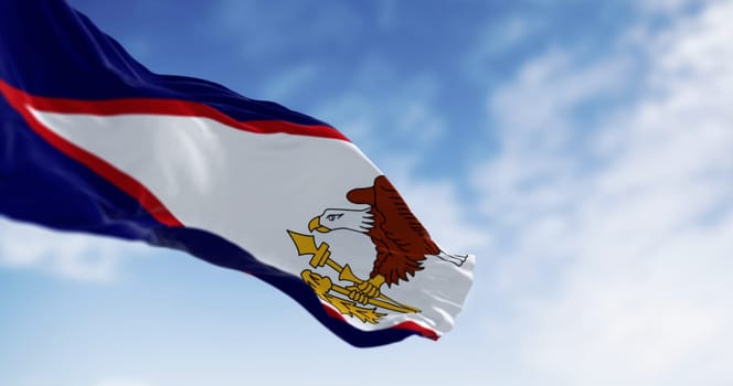Close-up of the American Samoa flag waving in the wind. Unincorporated territory of the United States located in the South Pacific Ocean. 3d illustration render. Selective focus