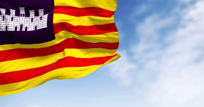Balearic Islands flag waving in the wind on a clear day. Four red lines on yellow with white castle on purple canton. 3D illustration render. Rippling fabric. Selective focus