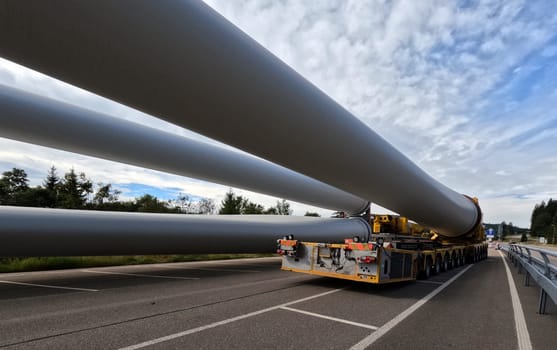 The 68-metre-long rotor blade is fixed to the 138-tonne self-propelled vehicle  The heavy transport of the 68-metre-long rotor blades leads over the Feldberg (Breisgau-Hochschwarzwald district) to Freiburg's local mountain,the Schauinsland  The rotor blades are mounted on a self-propelled vehicle,and they reach their destination at walking pace over several days  Topic picture wind energy