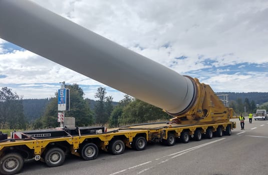 The wind conditions are good,the runner is ready and the self-propelled can take up the transport with the rotor blade,which is over 68 metres long,from the Feldberg Pass via the B317 federal road in the direction of Schauinsland  The heavy transport of the 68-metre-long rotor blades leads over the Feldberg (Breisgau-Hochschwarzwald district) to Freiburg's local mountain,the Schauinsland  The rotor blades are mounted on a self-propelled vehicle,and they reach their destination at walking pace over several days  Topic picture wind energy
