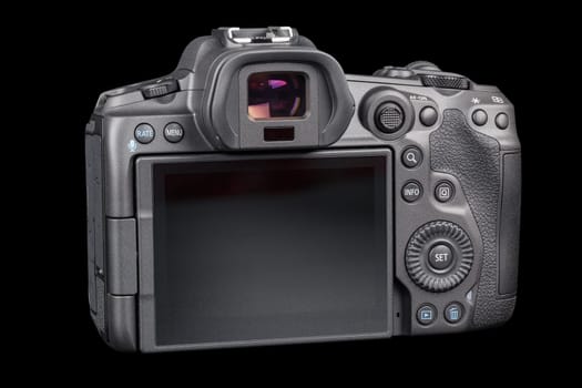 Canon R5 - black professional 35mm full-frame mirrorless camera body with flip screen isolated on black background with focus stacking - Tula, Russia, September 15, 2021