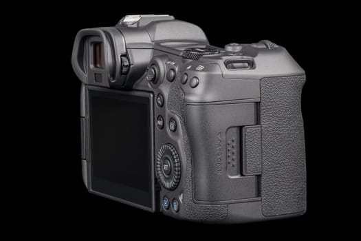 Canon R5 - black professional 35mm full-frame mirrorless camera body with flip screen isolated on black background with focus stacking - Tula, Russia, September 15, 2021