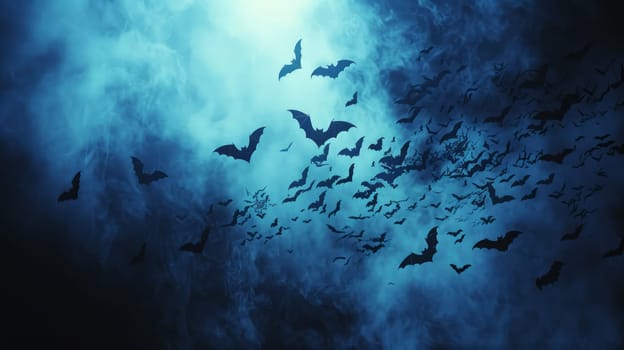 Large group of bats flying in the blue night sky with copy space