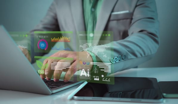 Businessman using computer and tablet to analyze investment concept, ESG, Environment social governance investment business concept, Social business strategy, Environment, Sustainability-related risks