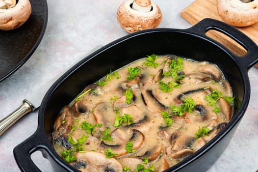 Mushrooms braised with cream sauce and fresh herbs.
