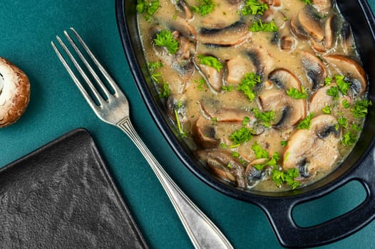 Mushrooms braised with cream sauce and fresh herbs.