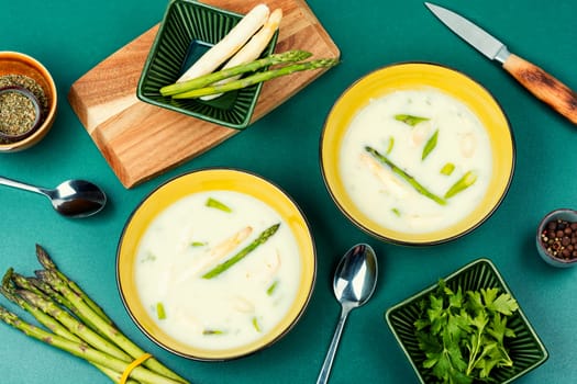 Soup with white and green asparagus. Vegan, healthy food