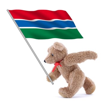 A Gambia flag being carried by a cute teddy bear