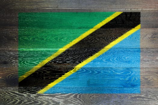 A Tanzania flag on rustic old wood surface background blue black yellow horizontal stripe green blue background illustration