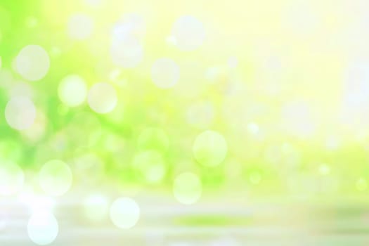 Abstract blurred fresh vivid spring summer light delicate pastel yellow green white bokeh background texture with bright circular soft color lights. Beautiful backdrop illustration.