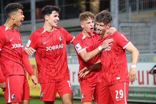 Cheeky: Leon Catak (SC Freiburg II / U23) celebrates his goal with his colleagues and his tongue sticking out to make it 3-0 in the match of the football RL SW 24-25: 9th Sptg: SC Freiburg II vs Bahlinger SC