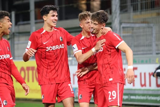 Football can be so beautiful: The Freiburg players celebrate the 3-0 by Leon Catak (SC Freiburg II / U23) (far right) in the match of the Football RL SW 24-25: 9.
