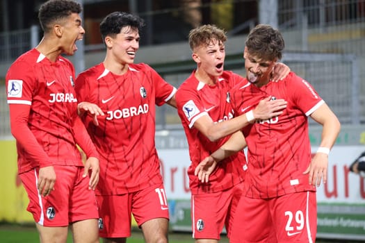 Football can be so beautiful: The Freiburg players celebrate the 3-0 by Leon Catak (SC Freiburg II / U23) (far right) in the match of the Football RL SW 24-25: 9.
