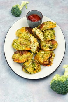 Fried vegetable cutlets with white sauce. Vegan broccoli cutlets. Cabbage cutlets.