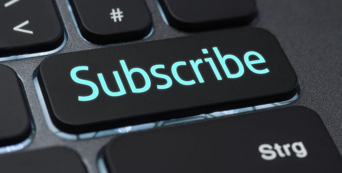 Illuminated keyboard with a labeled key - Subscribe