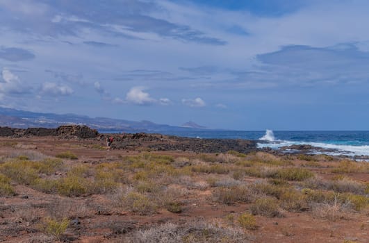 Gran Canaria, Spain: March 3, 2024: People at el Confital beach on the edge of Las Palmas, La Isleta peninsula. Gran Canaria, Spain