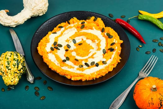 Autumn pumpkin risotto with parmesan cheese. Italian food. Top view