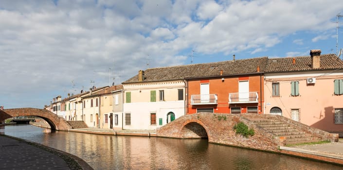 Comacchio, Italy - 11 June 2024. Characteristic village named Little Venice, with bridges and canals.