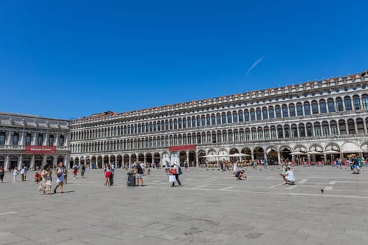 Venice, Italy - July 26, 2024: Tourist on San Marco square. Venice is very popular tourist destination. Venice, Italy