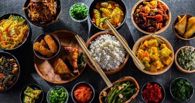 Composition with variety of east asian dishes.
