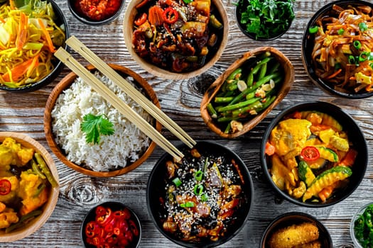 Composition with variety of east asian dishes.