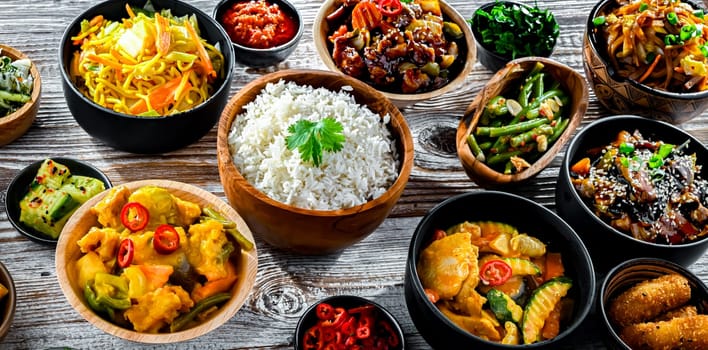 Composition with variety of east asian dishes.